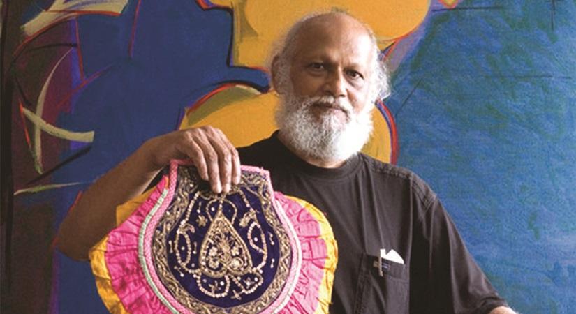 Jatin Das with a fan from his Pankha Collection