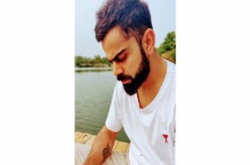 Indian cricket captain Virat Kohli showcased his love for his wife Anushka Sharma by flaunting a t-shirt with the actress's initials.