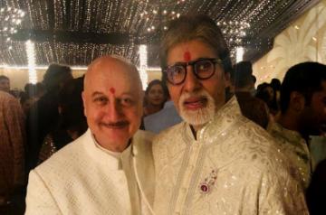 Actor Anupam Kher and Amitabh Bachchan during a Diwali party hosted by Bachchan at his residence Jalsa in Mumbai.