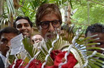 Superstar Amitabh Bachchan celebrates his 71st Birthday with his fans at his Pratiksha and Jalsa bungalow. He announced that Urja Foundation and  Dr. Harivansh Rai Bachchan Memorial Trust will provide free solar powered lights to around 3000 homes all across India from November 2013 at Janak Bunglow in Mumbai on Oct. 11, 2013. (Photo: B L Soni/IANS)