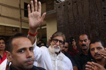 Mumbai: Actor Amitabh Bachchan greets fans who gathered outside his residence "Prateeksha" to wish him on his 77th birthday, in Mumbai on Oct 11, 2019. (Photo: IANS)