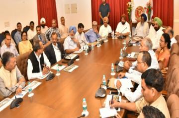 Punjab Chief Minister Captain Amarinder Singh chairs a high-level review meeting to assess the progress of the Sri Kartarpur Sahib Gurdwara corridor project with a team of officers from the Centre, in Chandigarh on Oct 1, 2019. (Photo: IANS)