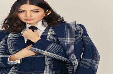 Actress Anushka Sharma took to Instagram to make a statement with her plaid jumpsuit look with formal twist, leaving actors Ranveer Singh and Arjun Kapoor gushing about her fashionable outing.
