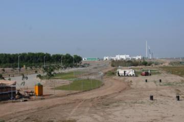 Dera Baba Nanak: Construction work in progress at the Pakistani side of the International border for the Kartarpur Corridor, as seen from Zero Point near Dera Baba Nanak in Gurdaspur district of Punjab, India on Oct. 24, 2019