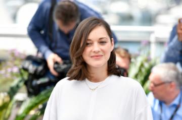 CANNES, May 17, 2017 (Xinhua) -- Actress Marion Cotillard of the film "Ismael's Ghosts" poses for a photocall before the opening of the 70th Cannes Film Festival in Cannes, France, on May 17, 2017. The film "Ismael's Ghosts" directed by French director Arnaud Desplechin will unveil the film festival at the opening ceremony. (Xinhua/Chen Yichen/IANS)