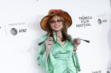 NEW YORK, April 20, 2017 (Xinhua) -- Singer Carly Simon attends the opening night of the 2017 Tribeca Film Festival and the world premiere of "Clive Davis: The Soundtrack of Our Lives" in New York, the United States, April 19, 2017. The 16th annual Tribeca Film Festival opened here Wednesday night, bringing a trove of films, TV events, virtual reality installations and music pieces to New York. (Xinhua/Wang Ying/IANS)