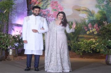 Mumbai: Actor Abhishek Bachchan along with his wife Aishwarya Rai Bachchan at the wedding reception of actress Sonam Kapoor and businessman Anand Ahuja in Mumbai on May 8, 2018. (Photo: IANS)