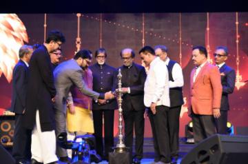 Panaji: Union Environment, Forest and Climate Change and Information and Broadcasting Minister Prakash Javadekar, Goa Chief Minister Pramod Sawant, Union MoS Environment, Forest and Climate Change Babul Supriyo, Information and Broadcasting Secretary Amit Khare, actors Rajinikanth and Amitabh Bachchan and Central Board of Film Certification Chairperson Prasoon Joshi light the lamp to inaugurate the 50th International Film Festival of India (IFFI-2019) in Panaji, Goa on Nov 20, 2019. (Photo: IANS