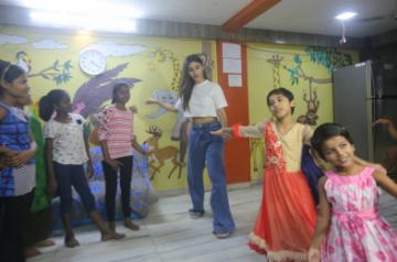 Mumbai: Actress Mouni Roy with underprivileged children during her visit to an NGO for Christmas celebrations, in Mumbai on Dec 23, 2019. (Photo: IANS)