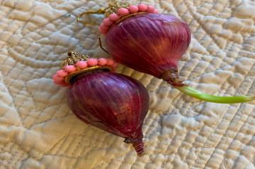 It looks like Twinkle Khanna can't stop obsessing over the new onion earrings that actor and husband Akshay Kumar gifted to her. She took to Instagram on Saturday to share a picture of her onion earrings once again, which have now started sprouting shoots.