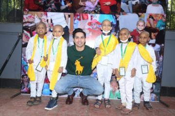 Mumbai: Actor Varun Dhawan during a programme with cancer patient childrens , in Mumbai on Dec 15, 2019. (Photo: IANS)