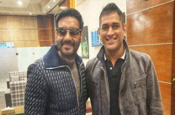 Bollywood actor Ajay Devgn met Former India captain M.S. Dhoni and said that cricket and films are the uniting religion of India. Ajay on Thursday morning shared a photograph of himself on Twitter posing with Dhoni.