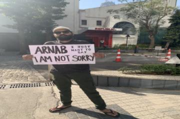 Stand-up comedian Kunal Kamra, who has been banned temporarily by several airlines, says he is sorry for "not being sorry". Kamra on Thursday took to Twitter, where he shared a photograph of himself holding a placard which read: "Arnab I just want to say I am not sorry." He captioned the image: "Sorry for not being sorry."