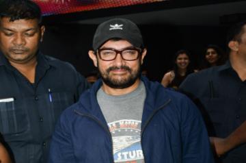 Mumbai: Actor Aamir Khan seen outside a theatre, in Mumbai's Juhu, on May 23, 2019. (Photo: IANS)