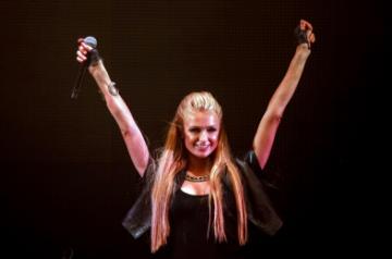 BOGOTA, Sep. 20, 2014 (Xinhua) -- Model, actress and singer Paris Hilton performs during her show "Paris Hilton DJ Set", in the outskirts of Bogota, capital of Colombia, in the first hours of Sept. 20, 2014. During her second visit to Colombia, Paris Hilton took part in the event with social cause since a charitable contribution will be donated to the Global Art Foundation, a non-profit aimed to the development of cultural and artistic guilds of the country that seeks to rescue, support and prom