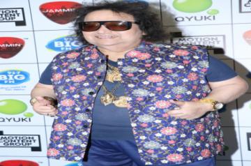 Mumbai, June 25 (IANS) Veteran composer-singer Bappi Lahiri has a happy last memory of Kishore Kumar. He recalls how the legendary playback singer-actor made everyone laugh while recording their last song together.	(File Photo: IANS)