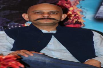 Filmmaker Vijay Krishna Acharya addresses during a promotional event of his upcoming film `Dhoom 3` in Chennai on Dec.17, 2013. (Photo: IANS)
