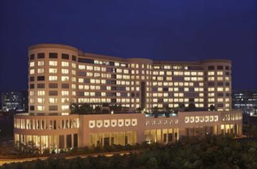 Trident Bandra Kurla, Mumbai Hotel Facade at Night.