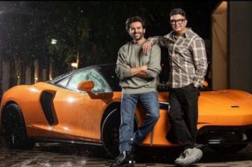 Bhushan Kumar gifts Kartik Aaryan India's first GT Orange McLaren to celebrate 'Bhool Bhulaiyaa 2' success.
