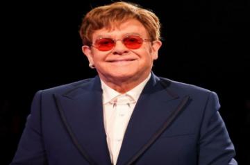 Elton John says he's in 'top health' despite being seen in wheelchair
