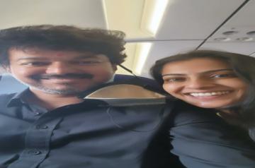 Perfect flight, says Varalaxmi after meeting actor Vijay on flight.