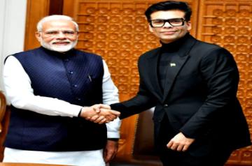 Prime Minister Narendra Modi and Bollywood filmmaker Karan Johar. (Image: Twitter).
