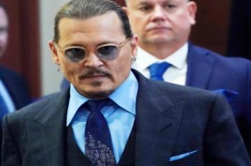 Johnny Depp settles assault case with City of Lies' location manager.