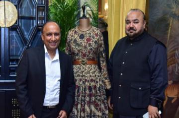 Shashank Srivastava and JJ Valaya pose with the outfit from the collection