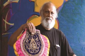 Jatin Das with a fan from his Pankha Collection