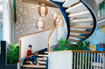 Highlight colours in meeting rooms, fostering a visual break within a meeting space, vs colours arranged to highlight a dramatic spatial connect and focus on a marque element. (Image Courtesy: COWRKS India)